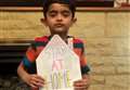 Young boy shares stay at home message through play