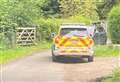 Armed police called to woodland as manhunt launched