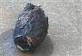 Unexploded grenade pulled out of river