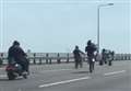 Bikers caught performing stunts on bridge 