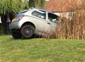 Driver charged after 'crashing into pond'