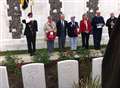 Immigrant stows away on war graves trip 