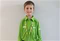 Boy chooses Asda worker for school's superhero day