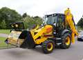 Digger enthusiast carried to funeral in JCB