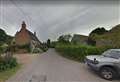 Roads closed and warning over fire at thatched property