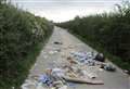 Rubbish strewn across road 'dangerous'