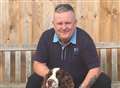 Dog roaming railway lines reunited with owners