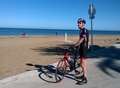 'Inspirational' cyclist's son fundraises in his honour