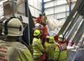 Man trapped as floor collapses at warehouse