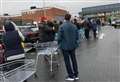 Shoppers queue early over virus fears