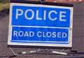 Road closed after car smashes into tree