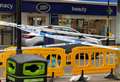 Police tape off high street as plaster falls from shop