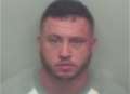 Thug jailed for holding knife to victim's throat