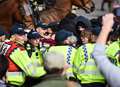Police arrest 16 after protesters clash