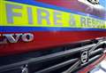 Blaze spreads through roof of house