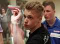 Young darts player aiming for the top