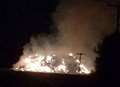 Crews spent night battling 2,000 tonnes of flaming straw