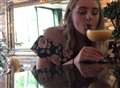 Cheers! Girl takes first alcoholic drink ever after bet