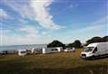 Travellers pitch up on seafront land