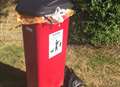 Overflowing dog waste bin sparks resident protest