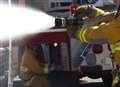 Man suffers burns as fire destroys roof