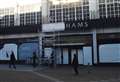 Sign of the times as Debenhams shop front comes down