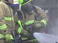 Fire crews tackle garage blaze