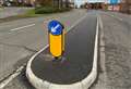 Traffic island extended 'to keep drivers on correct side of road'