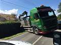 Road shut after lorry gets stuck in ditch
