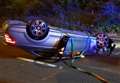 Overturned Mercedes after motorway crash