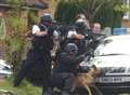 Armed siege man shot by police