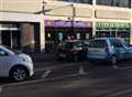 Car goes into railings in town centre