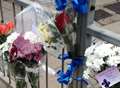Floral tributes after man dies 'falling into path of reversing van'