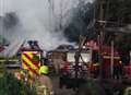 Large woodchip fire in village