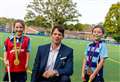 Olympic rower returns to open new school building