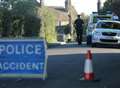 Police close road after man hit by vehicle