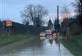 Flooding submerges playground and shuts roads 