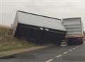 Lorry trailer overturns in extreme weather conditions