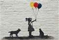 Updates to town's Banksy-style artwork