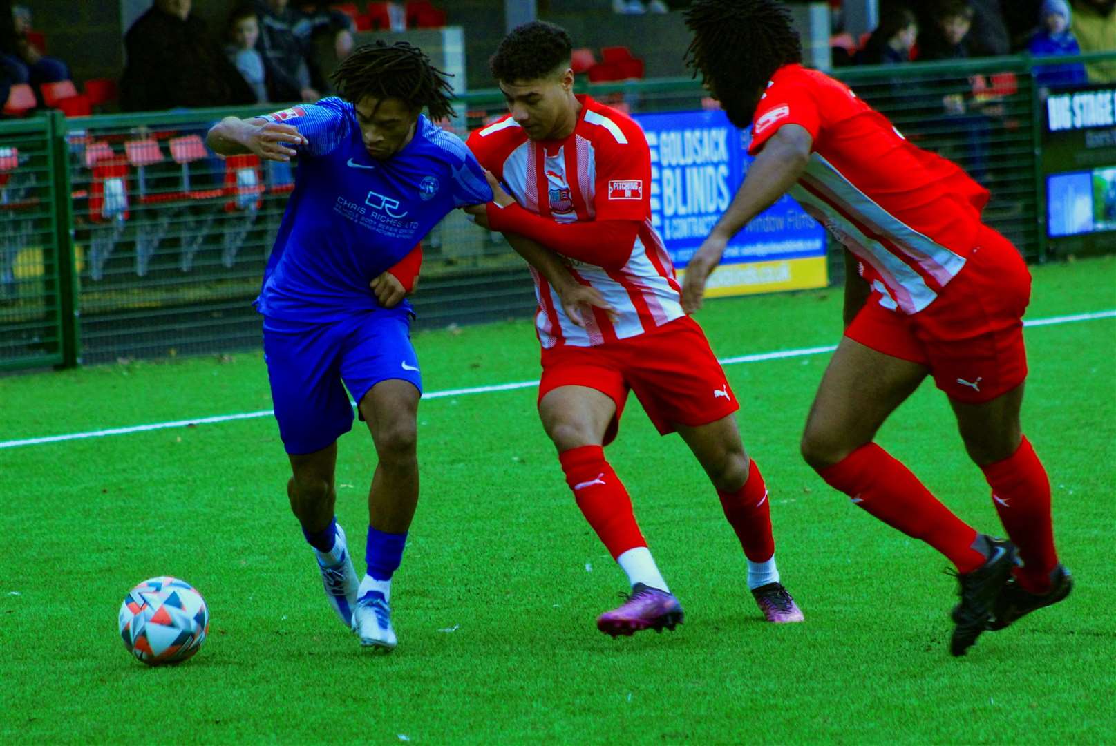 Herne Bay's Kymani Thomas being held by the away defence in the home team's 3-1 win against Bowers & Pitsea. Picture: Keith Davy