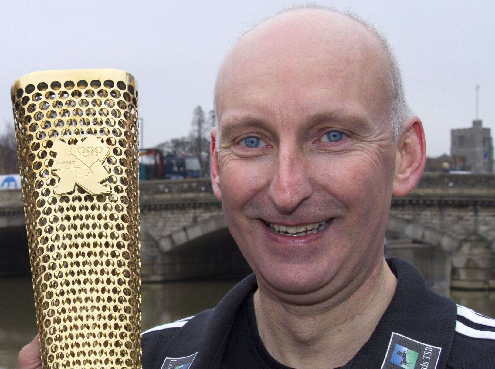Det Sgt Melwyn Moore with the Olympic torch in 2012. Picture: Roger Vaughan