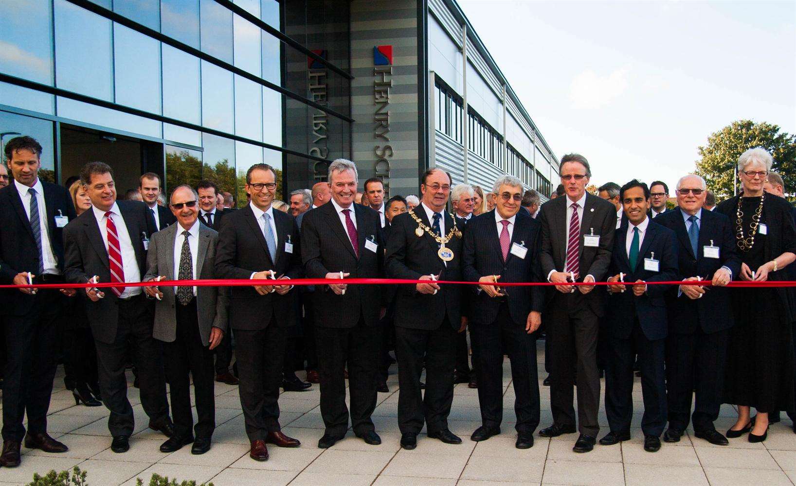 Medway's mayor Cllr Barry Kemp and Gillingham and Rainham MP Rehman Chishti join Henry Schein's chief executive Stanley Bergman to cut the ribbon on the new 85,000 sq ft building at Gillingham Business Park