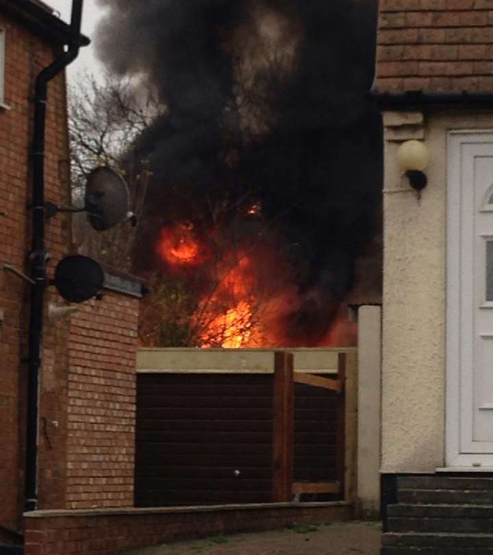 A fierce fire erupted in the Cruden Road shed. Picture: Maxine Springett