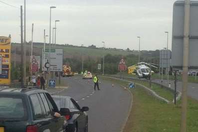 Police closed the road to allow the air ambulance to land. Picture: Mark Reckless