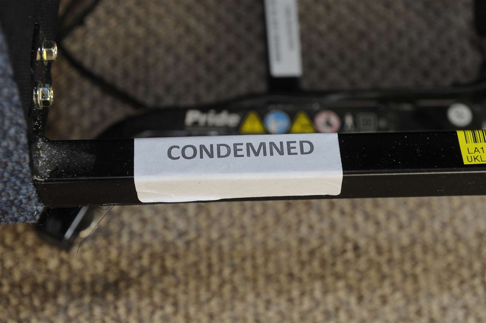 A sticker on the chair saying it is "condemned"
