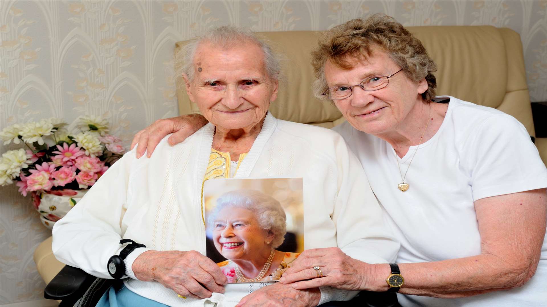 Cecilia Larner, celebrating her 107th birthday with a card from the Queen, with her daughter Sheila Bodle