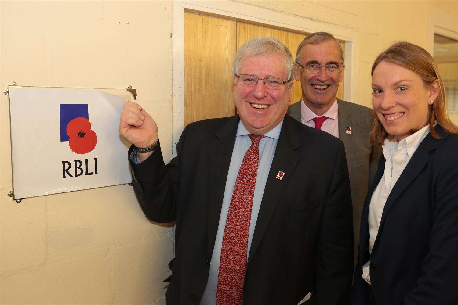 Transport Secretary Patrick McLoughlin reveals a new plaque with RBLI chief executive Steve Sherry and Chatham and Aylesford MP Tracey Crouch