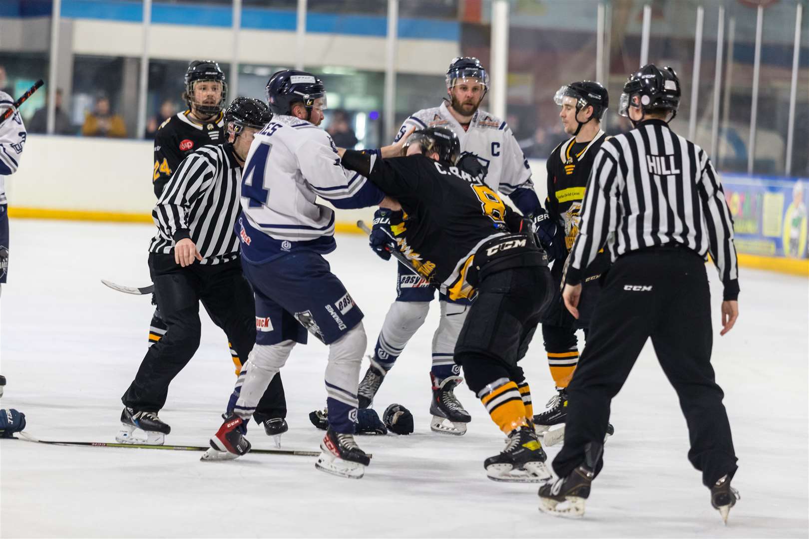 Invicta Dynamos' Michael Stokes in a tussle with Chelmsford Chieftains' Cameron Bartlett Picture: David Trevallion