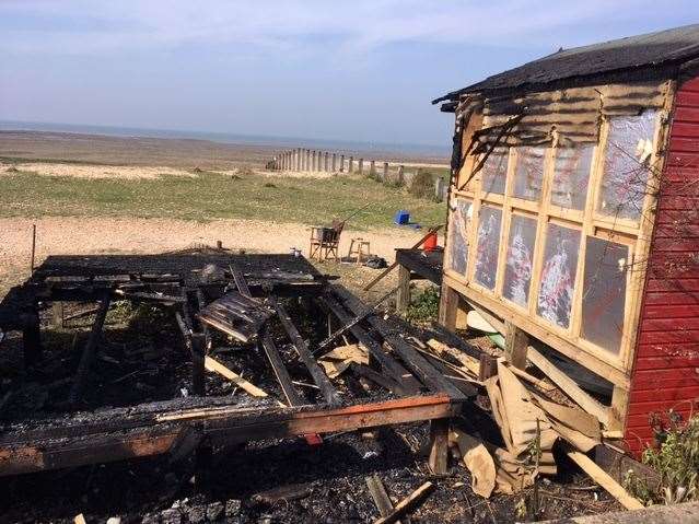 One beach hut has been razed to the ground and two others damaged following an arson attach in Whitstable. Picture: Mel Green