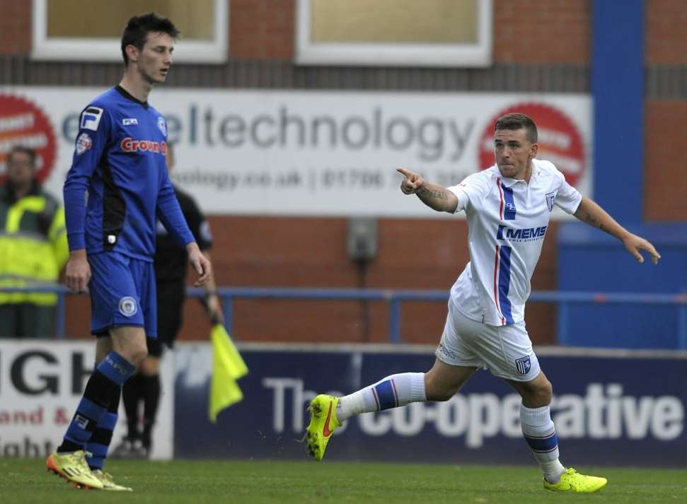 Cody McDonald celebrates his goal for Gills at Rochdale. Picture: Barry Goodwin